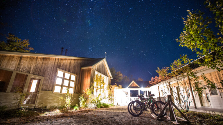 Stratton Brook Hut at night in the summer.