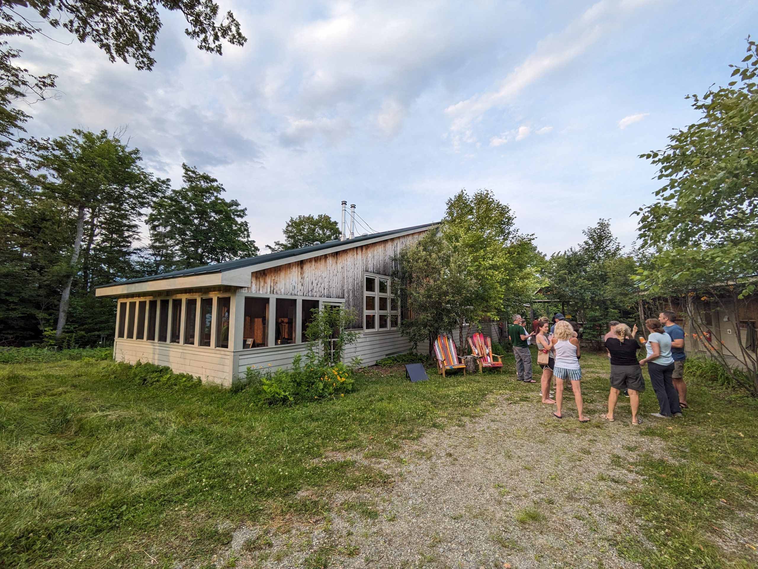 Guests outside Stratton Hut in summer.