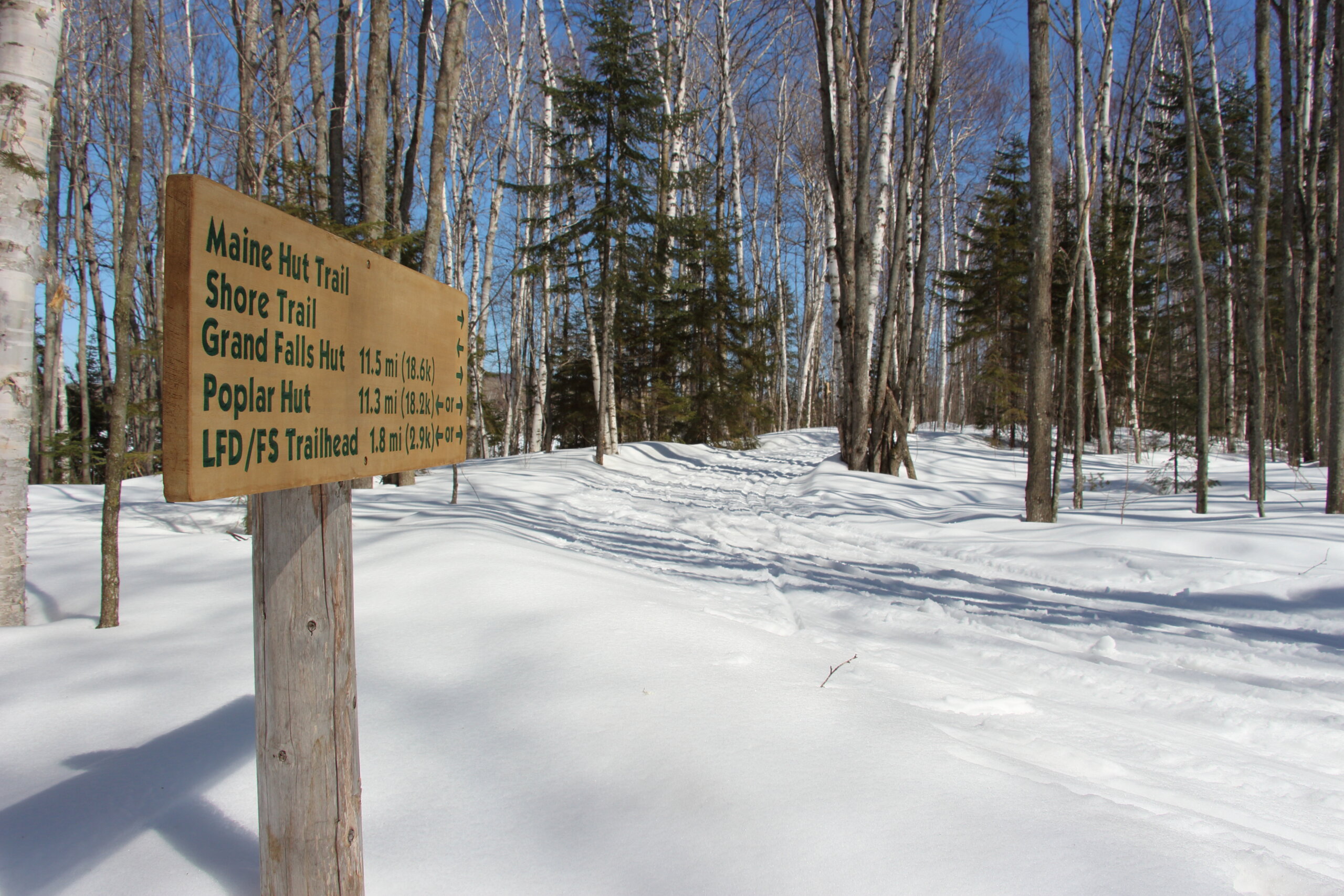 Trail sign at Flagstaff Lake Hut.