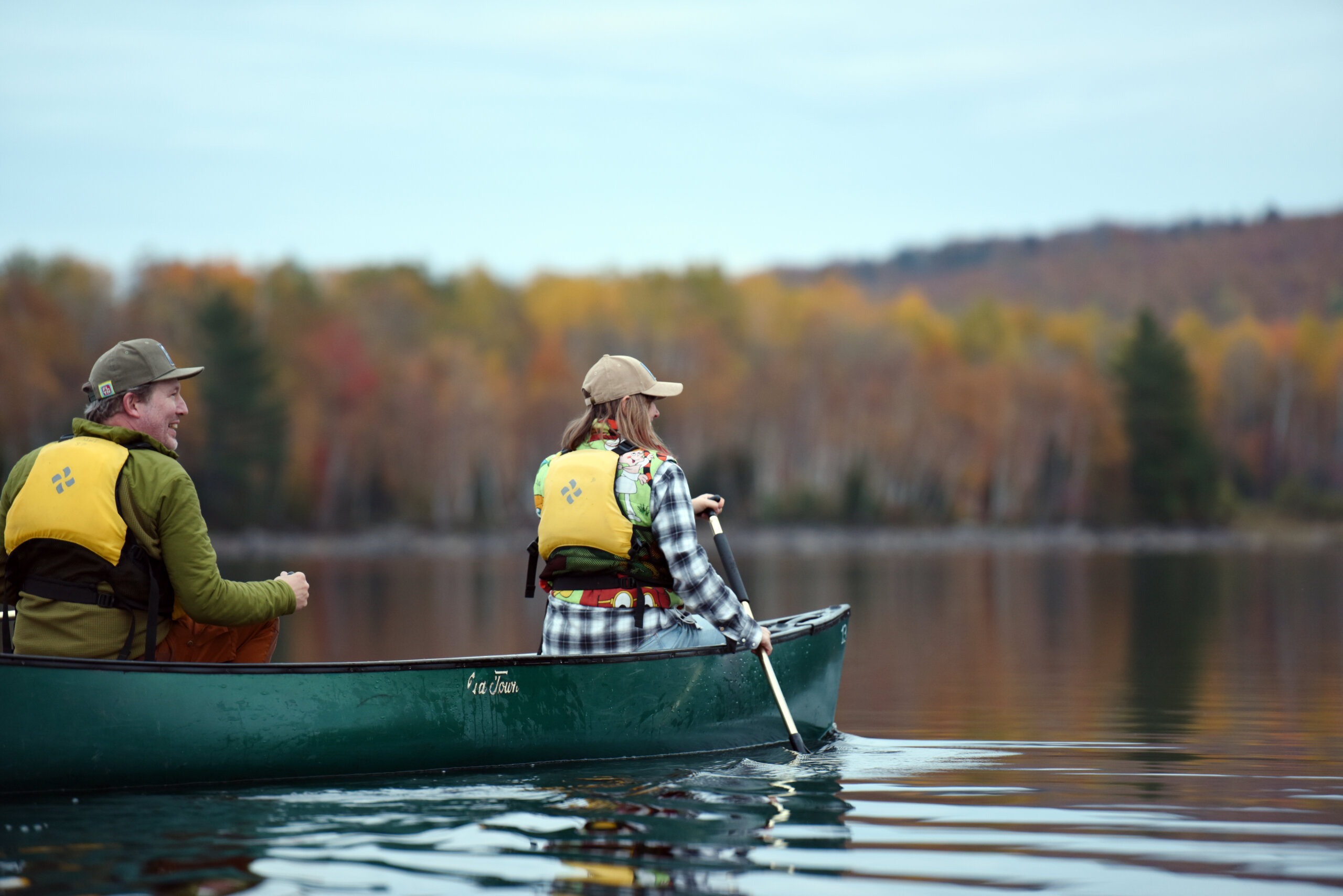 Canoeing on Flagstaff Lake Hut in autumn
