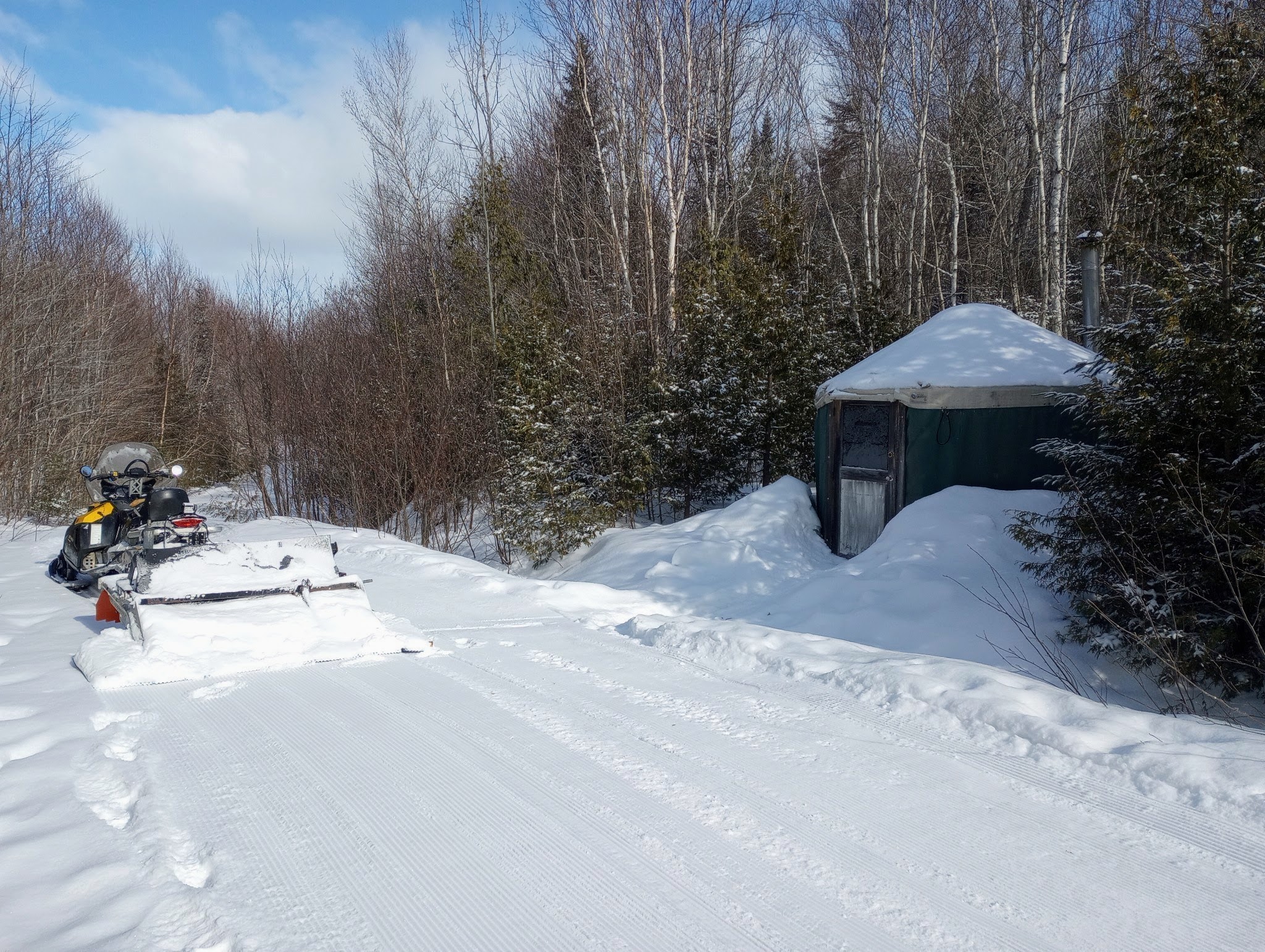 Fresh tracks by the groomer at the Halfway Yurt.