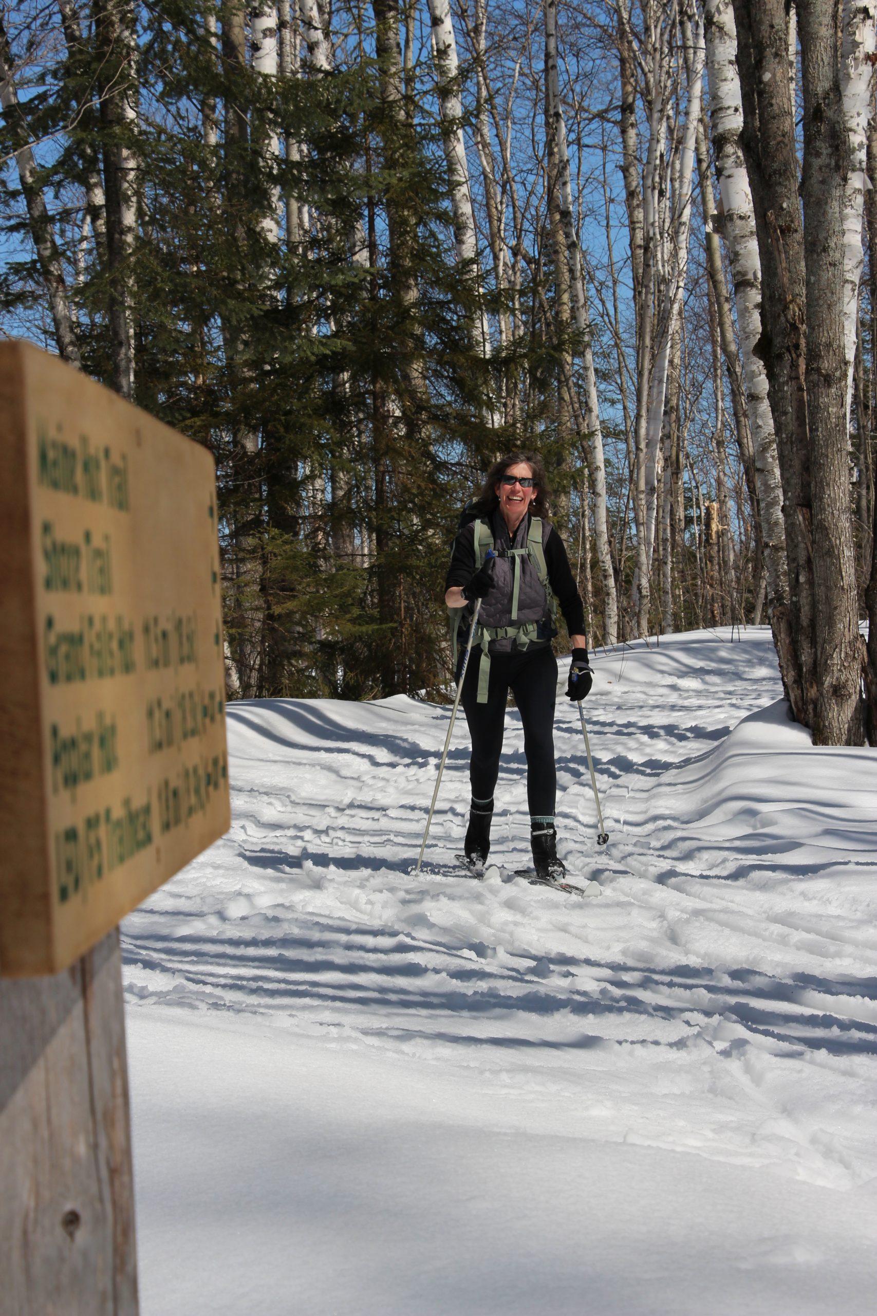 Woman cross country skiing on the Maine Hut Trail.