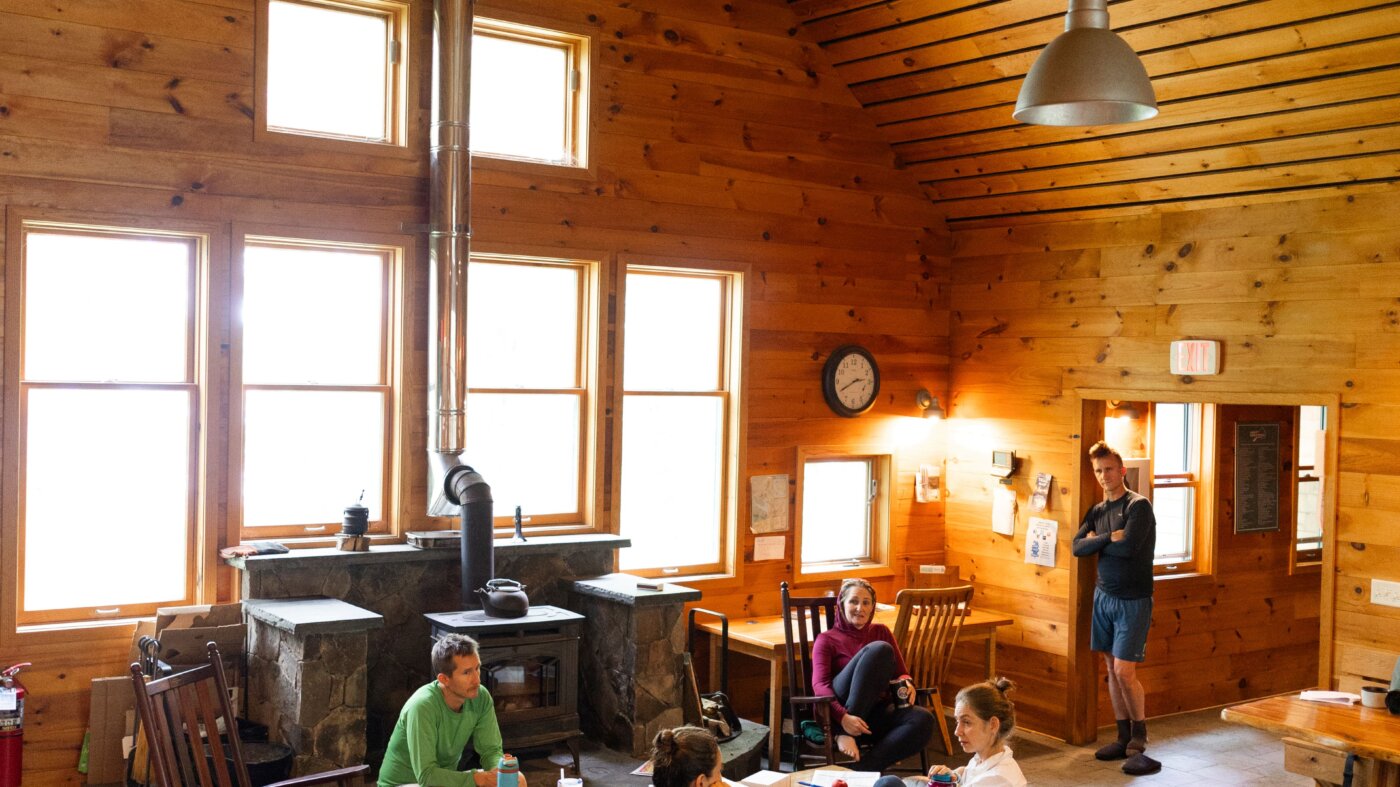 Relaxing in the Great Room at Flagstaff Lake Hut.