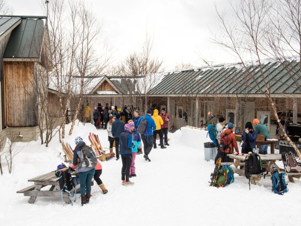 Outside of Stratton Brook Hut during the Alpine Feast event.
