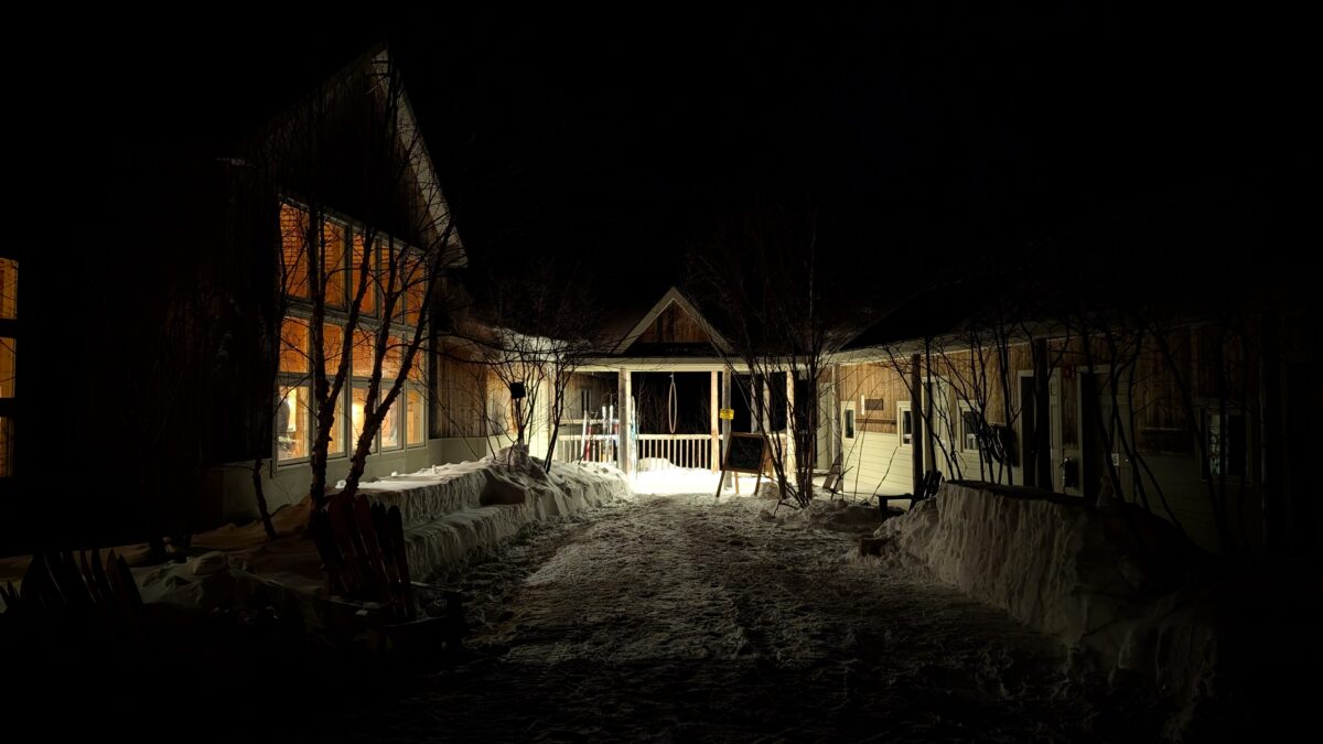 Stratton Brook Hut at night in winter.