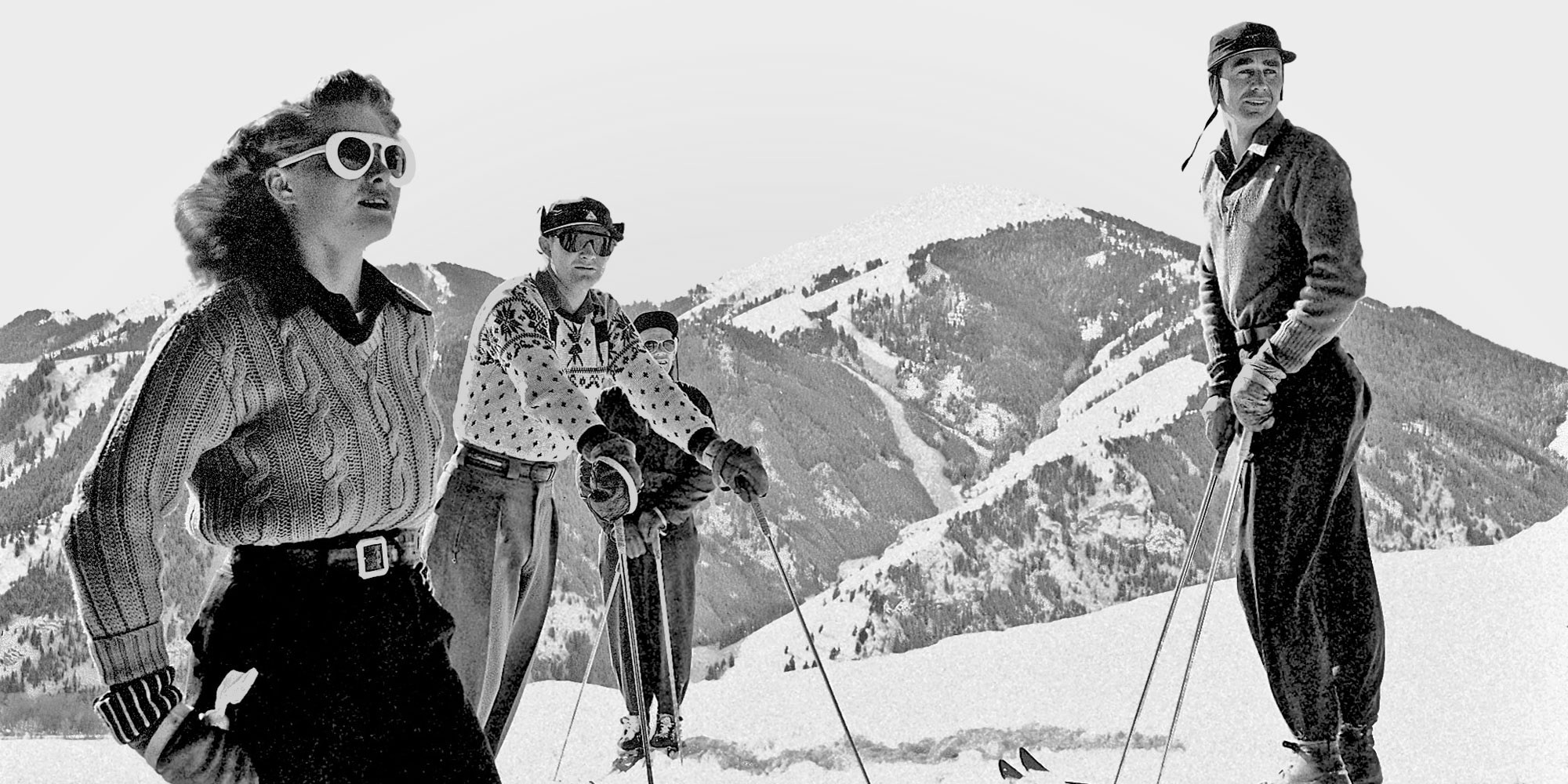 Vintage black and white photo of skiers