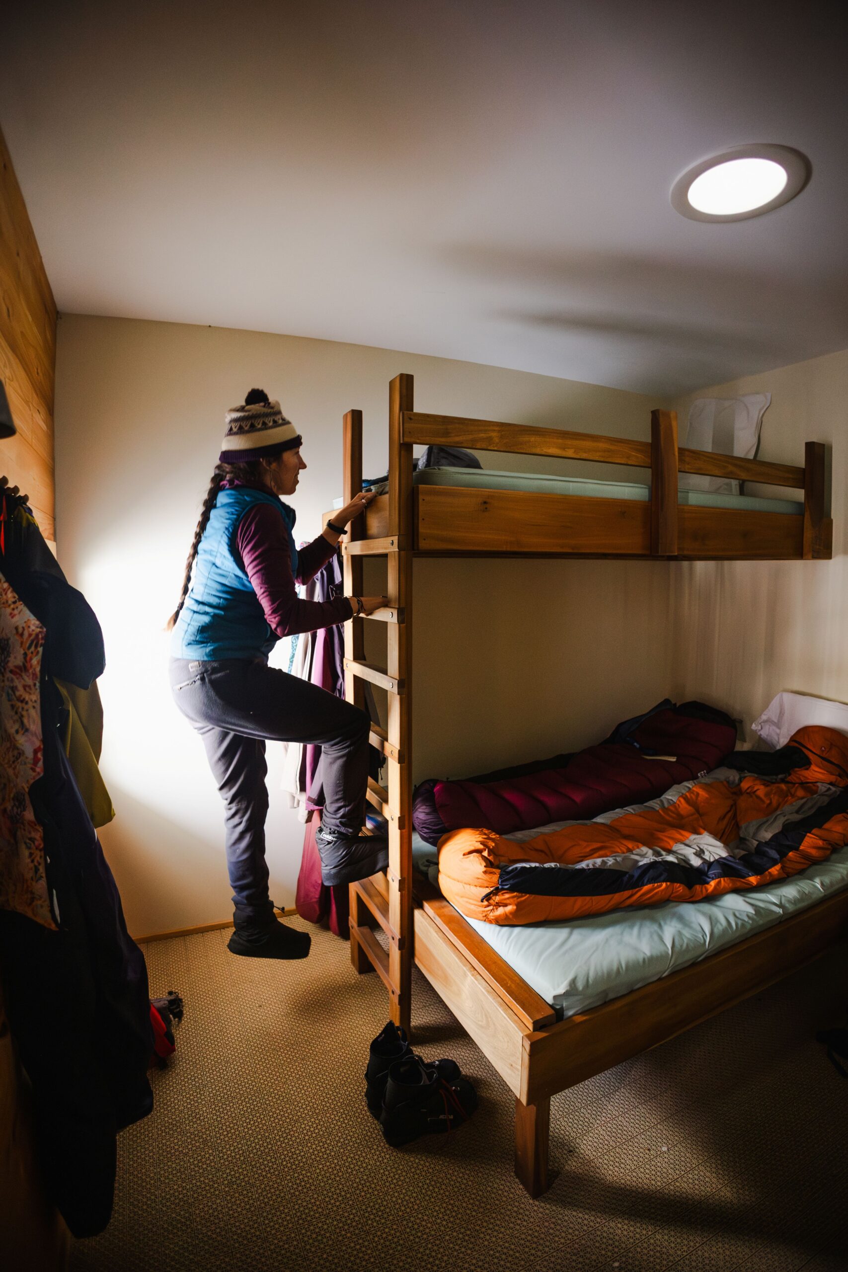 Three person bunkroom with guest and gear