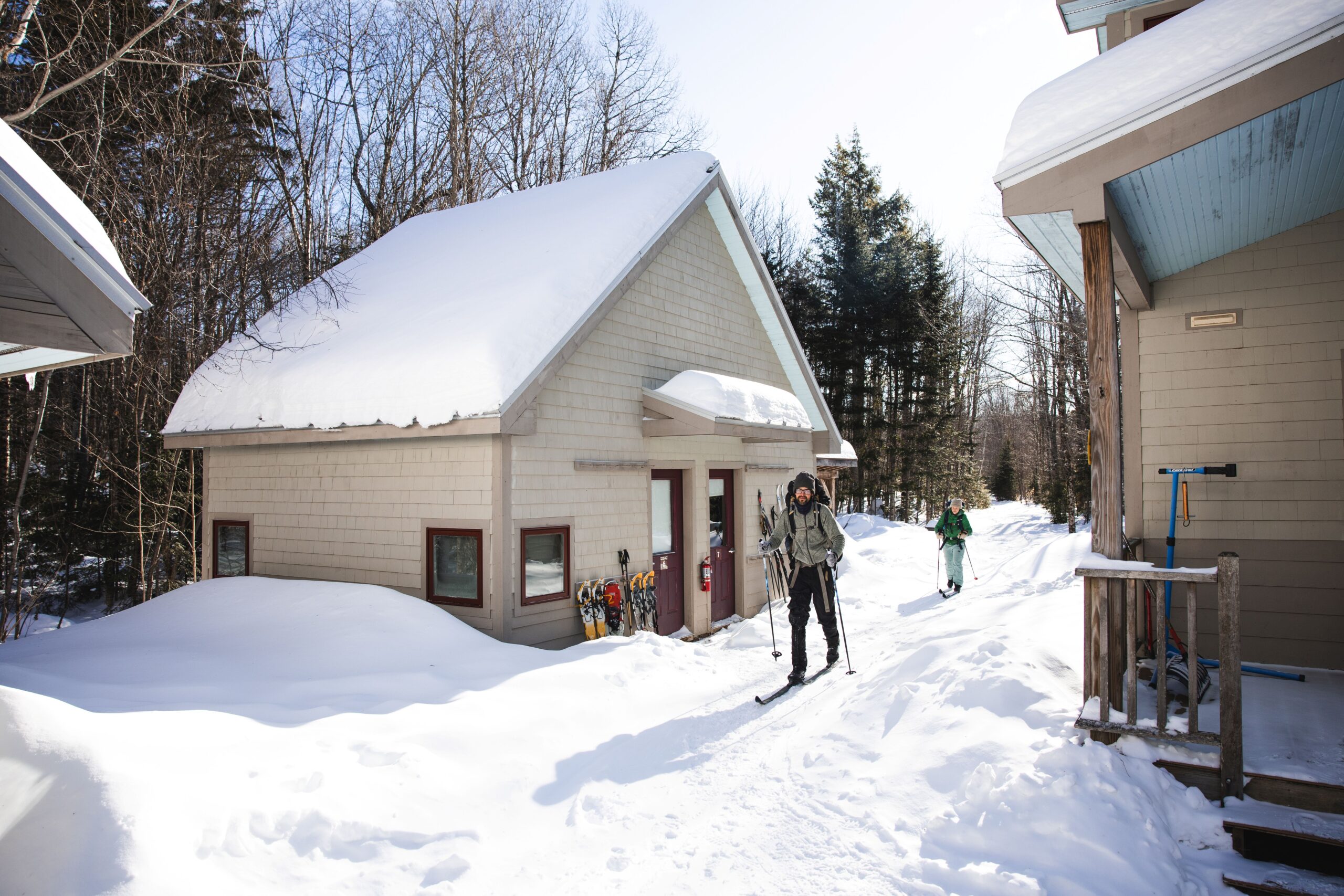 Skiers leaving Poplar Stream Hut.