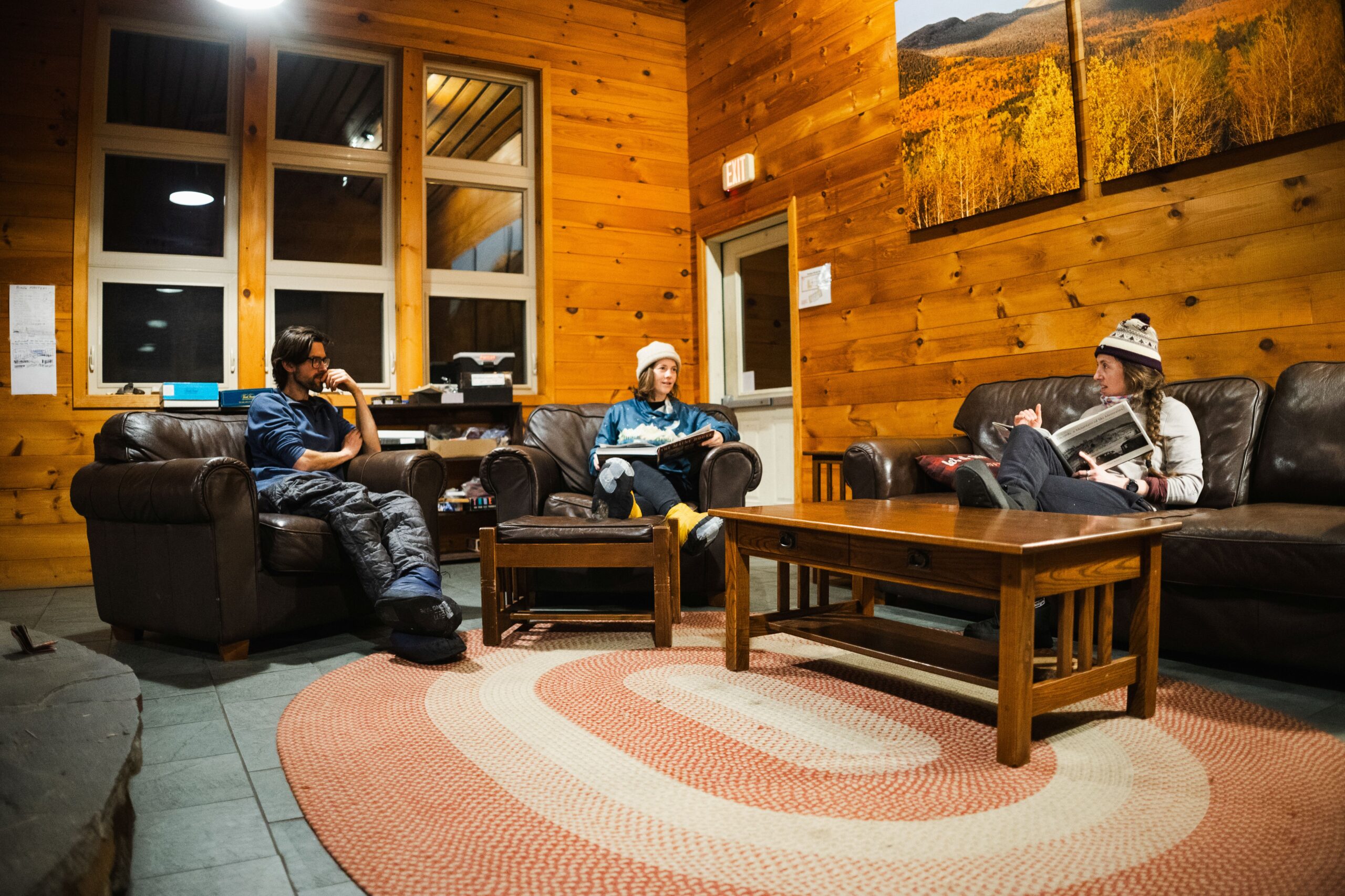 Reading in the lounge at Stratton Brook Hut
