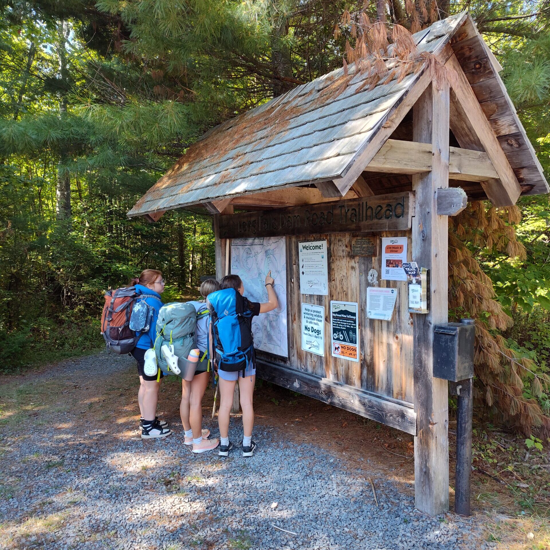 hikers at kiosk