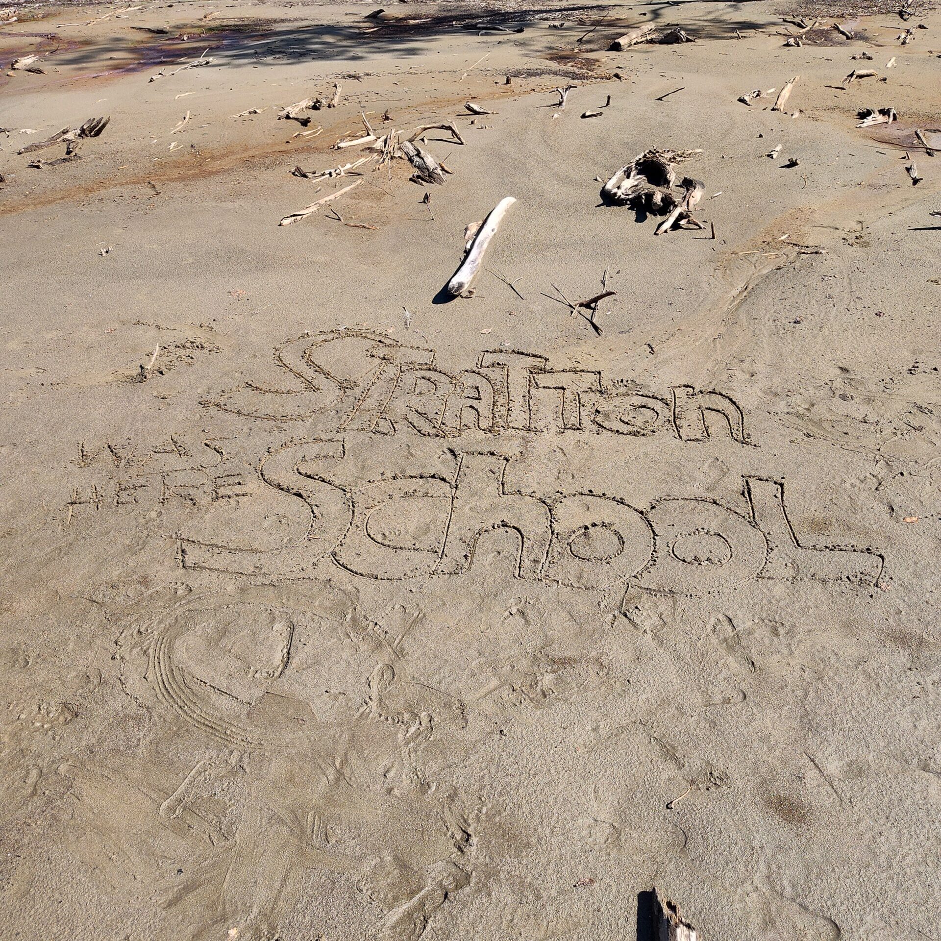 Stratton School writing in sand