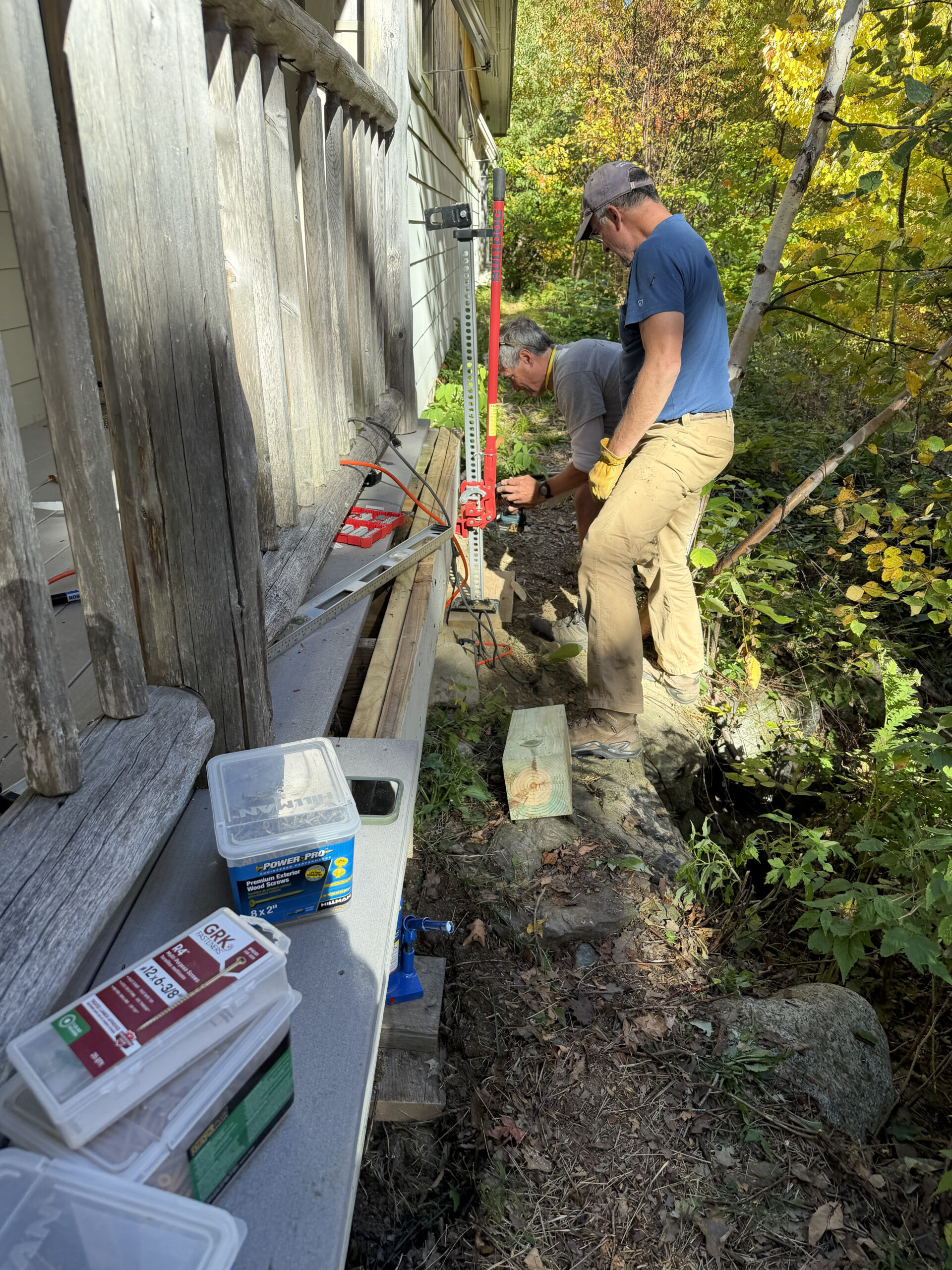 Board members Calen Colby and Fred Prescott working on the deck at Stratton Brook Hut.